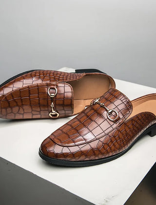 Brown croc-embossed leather mules with slip-on bit strap and low black heel