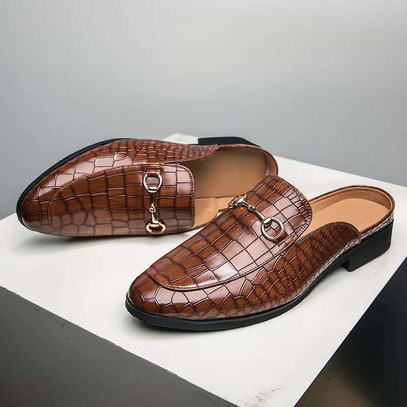 Brown croc-embossed leather mules with slip-on bit strap and low black heel