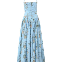 Light blue floral midi dress with spaghetti straps and gathered skirt