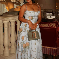 Light blue floral midi dress with spaghetti straps and square neckline