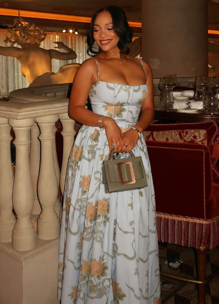 Light blue floral midi dress with spaghetti straps and square neckline