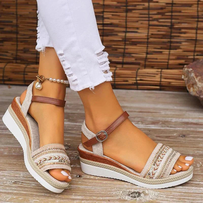 Woven espadrille wedge sandals with brown ankle strap and multicolor embroidered trim