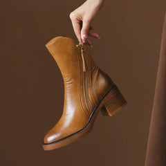 Tan ankle boots with side zipper and tassel pull, chunky block heel