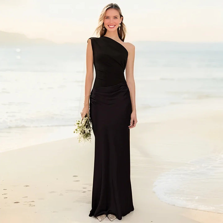 One-shoulder maxi dress in black, sleeveless fitted bodice and floor-length skirt