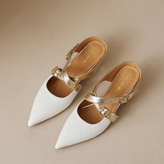 White genuine leather mules with gold-tone buckles, pointed toe, and low heel
