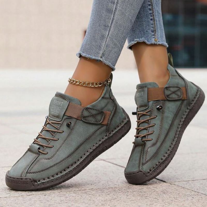 Orthopedic comfort sneaker in olive-green with lace-up and side strap detail.