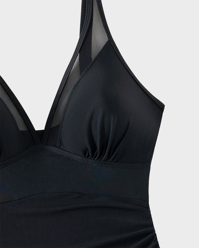 Black mesh triangle bra-style top section with V neckline and smooth padding