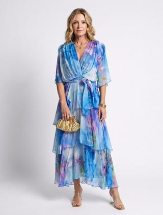 Blue sheer layered maxi dress with V-neck and tie waist, tiered ruffle skirt