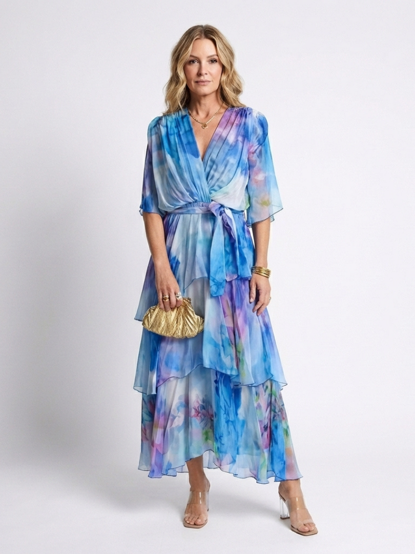 Blue sheer layered maxi dress with V-neck and tie waist, tiered ruffle skirt