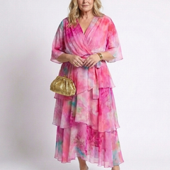 Pink tie-dye sheer maxi dress with V-neck, tie waist, layered tiers and ruffles