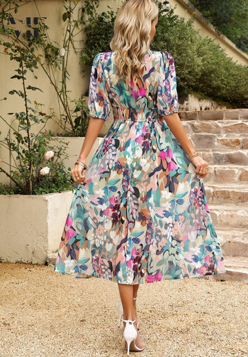 Floral midi dress in multicolor blue with short sleeves, tiered skirt, and V-neckline