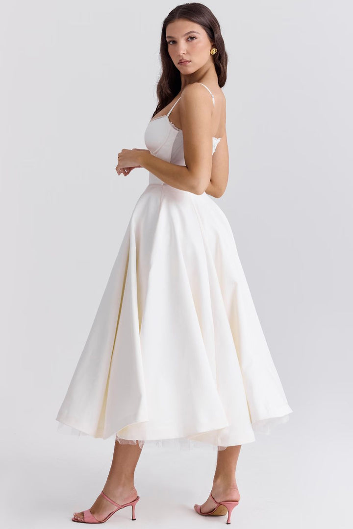 White sweetheart dress with thin straps and layered flared skirt
