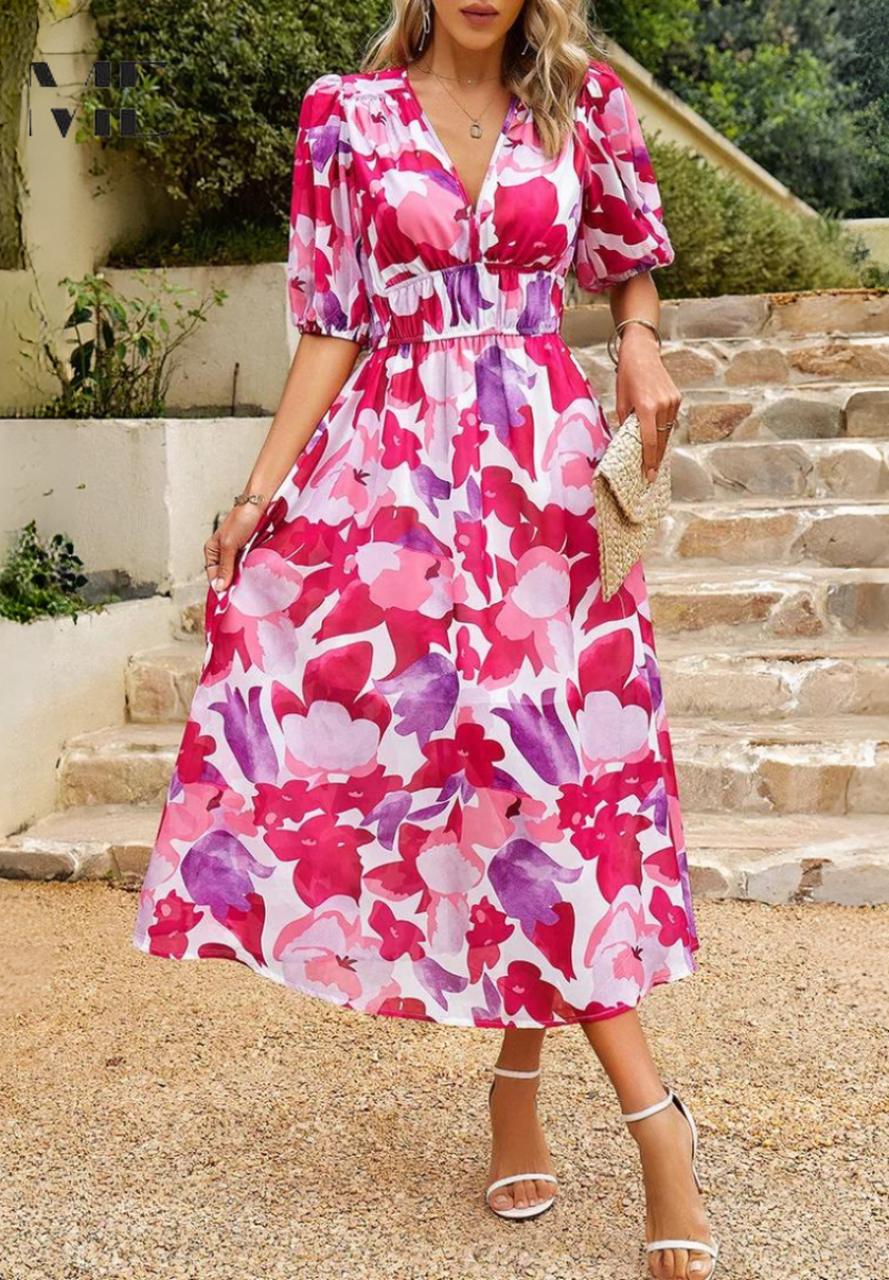 Pink floral midi dress with V-neck, puff sleeves, and gathered tied waist