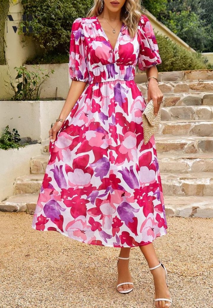 Pink floral midi dress with V-neck, puff sleeves, and gathered tied waist