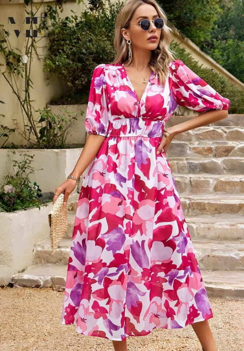 Pink floral midi dress with V-neck, puff sleeves, and cinched waist