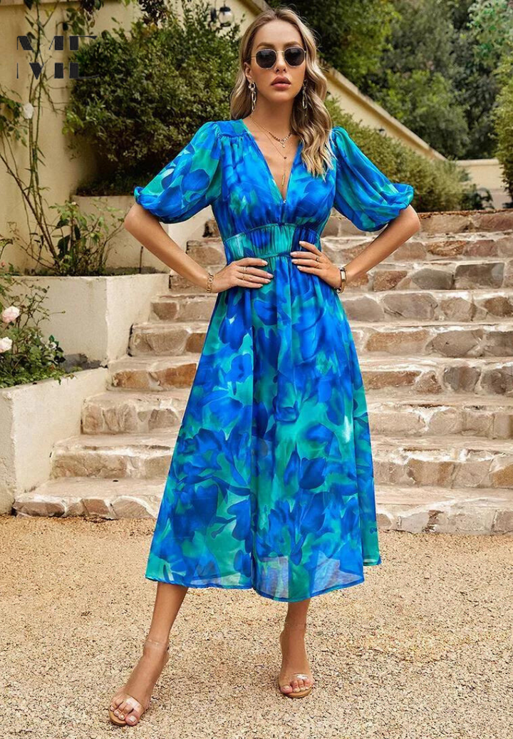 Blue watercolor floral midi dress with V-neck, puff sleeves, and cinched waist