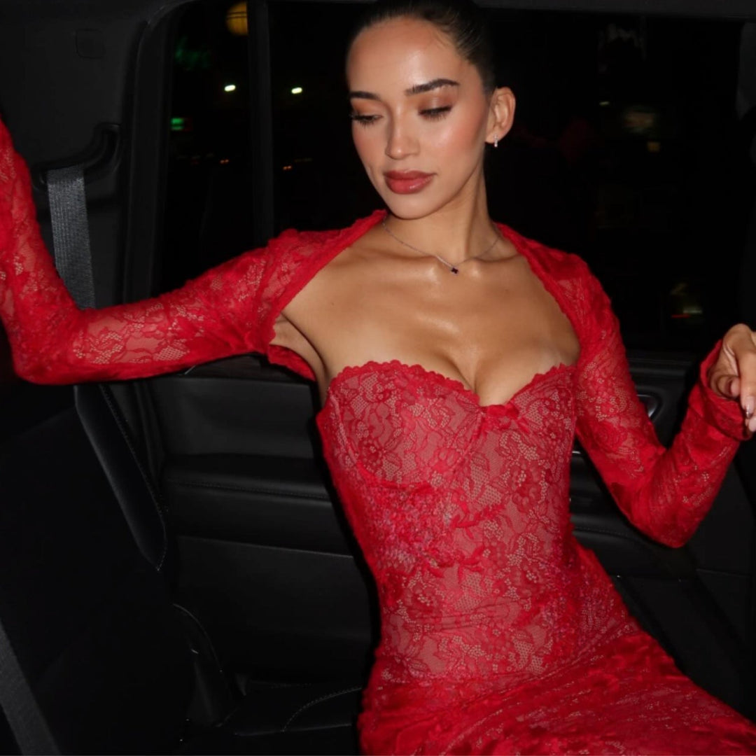 Red lace maxi dress with long sleeves and sweetheart neckline, fitted corset-style
