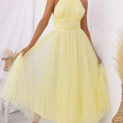 Yellow halter turtleneck midi dress with sleeveless bodice and voluminous tulle skirt