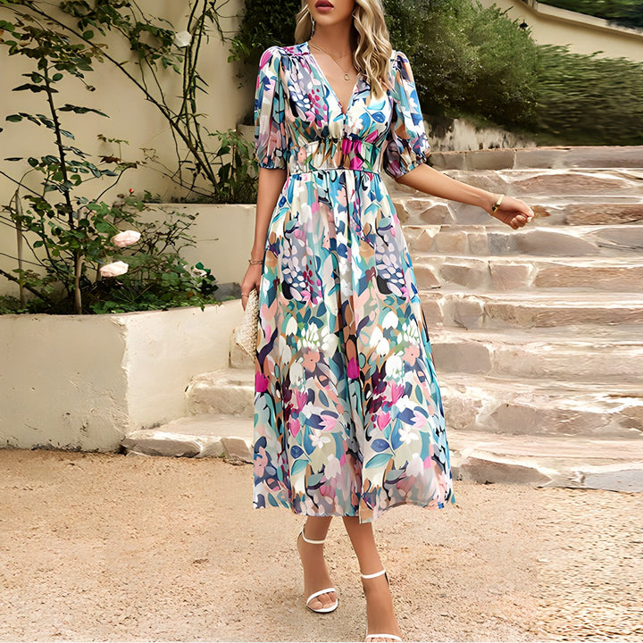 Multicolor V-neck midi dress with puff sleeves and gathered waist, floral abstract print.