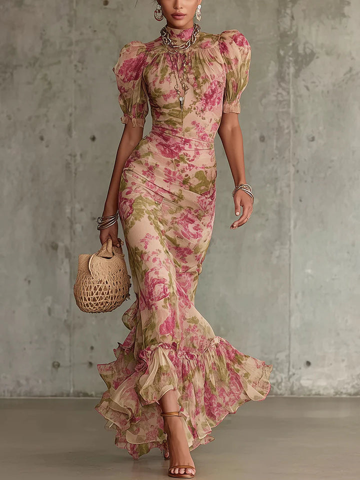 Vintage floral maxi dress with puff sleeves, fitted bodice, and ruffled hem; pink-green on cream.