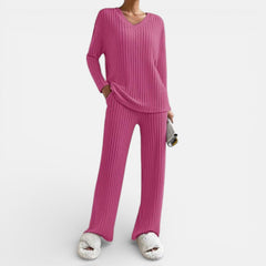 Pink ribbed knit loungewear set with V-neck long-sleeve top and wide-leg pants