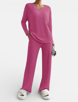 Pink ribbed knit loungewear set with V-neck long-sleeve top and wide-leg pants
