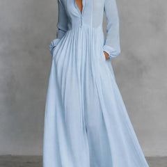 Light blue long-sleeve maxi dress with V-neck, button-front bodice, gathered waist