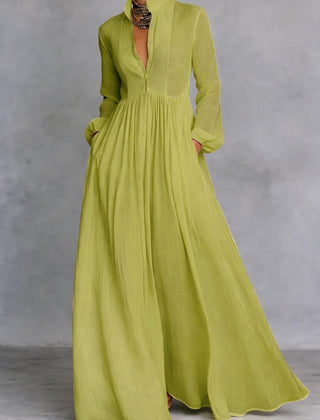 Green long-sleeve maxi dress with V-neck and gathered, pleated full skirt