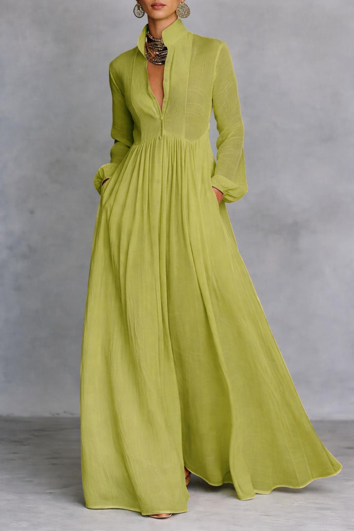 Green long-sleeve maxi dress with V-neck and gathered, pleated full skirt