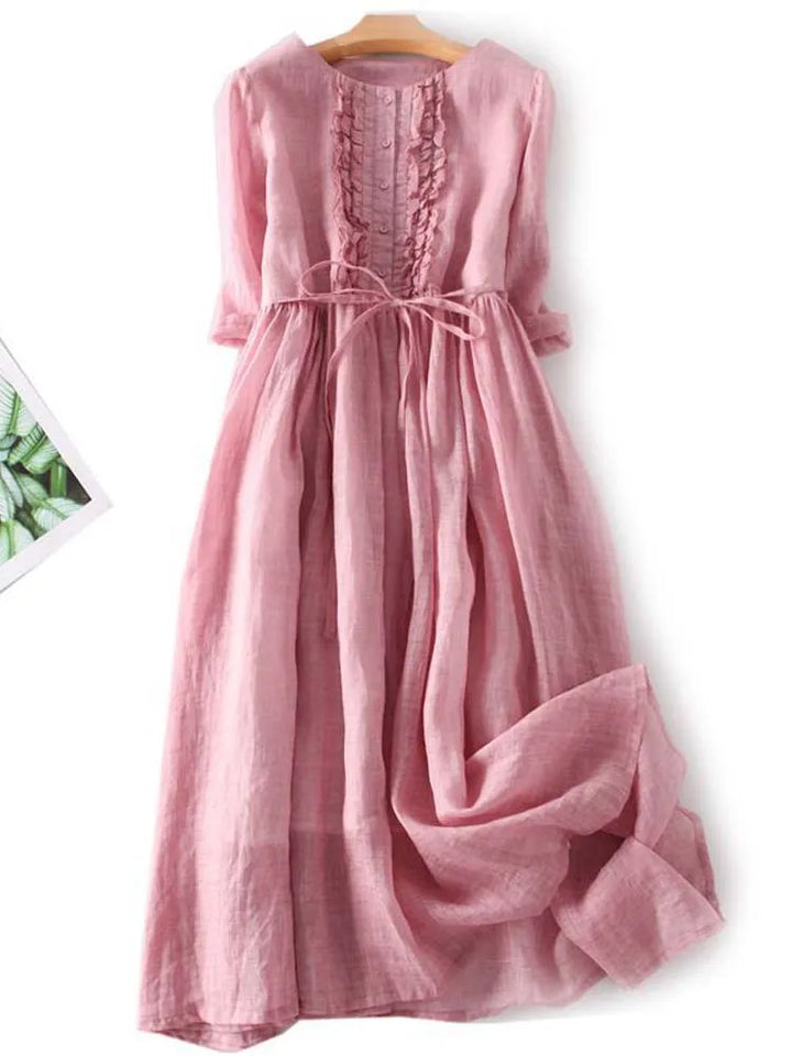 Pink linen dress with ruffled button placket and waist tie, short puff sleeves