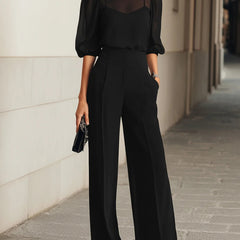 Black blouse with sheer puff sleeves and wide-leg pants set, front full view