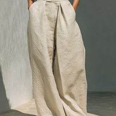 Beige sleeveless top and wide-leg pants set with front pleated waist
