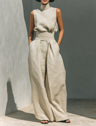 Beige sleeveless top and wide-leg pants set with waist tie and front pleats
