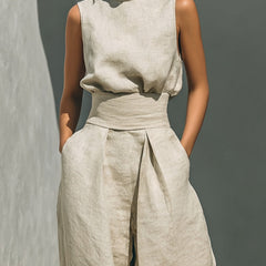 Beige sleeveless top and wide-leg pants set with draped waist detail