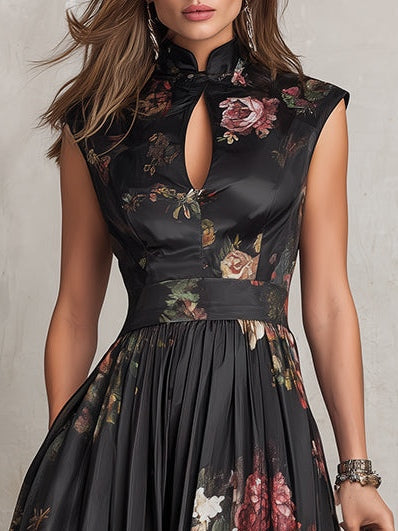 Close-up of sleeveless midi dress neckline cutout with floral embroidery detail