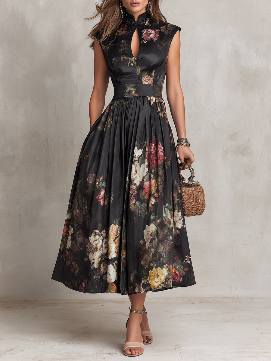 Sleeveless elegant midi dress in dark fabric with floral print and pleated skirt