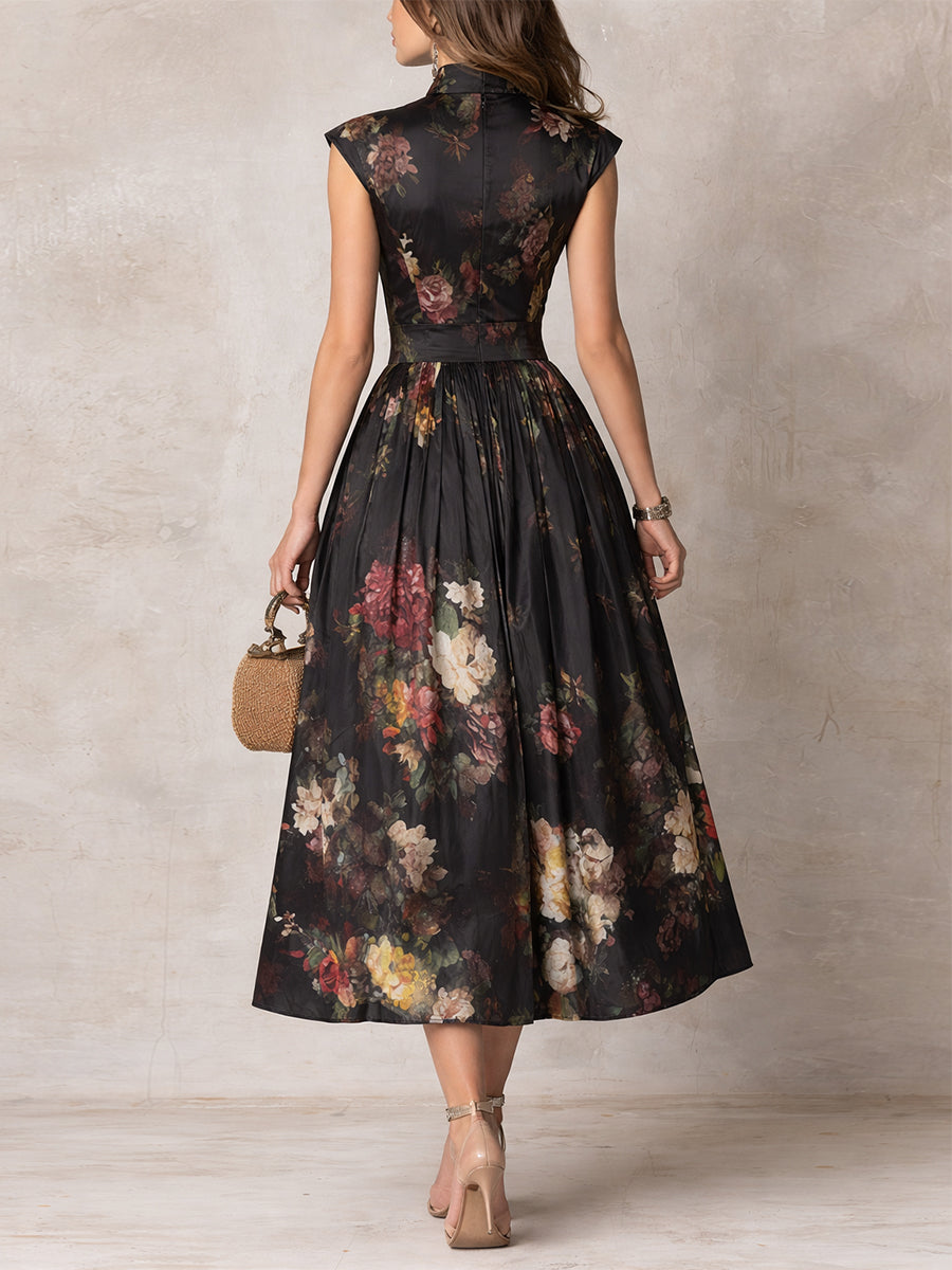 Back view of sleeveless midi dress with dark floral print and pleated skirt