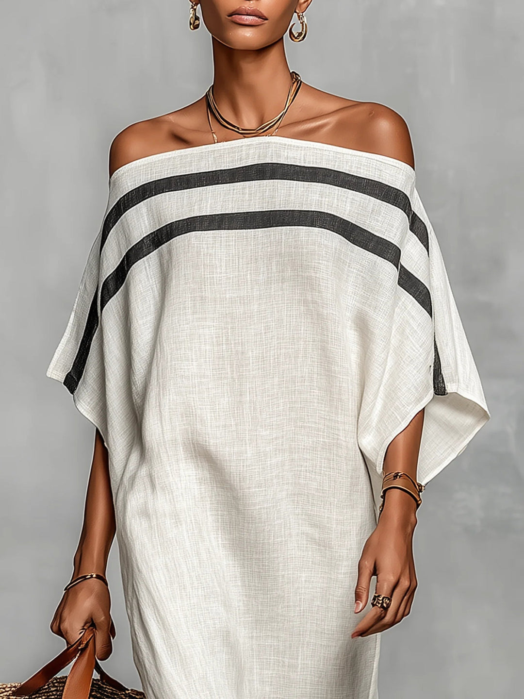 White linen off-shoulder maxi dress with wide black-and-gray striped band, loose fit