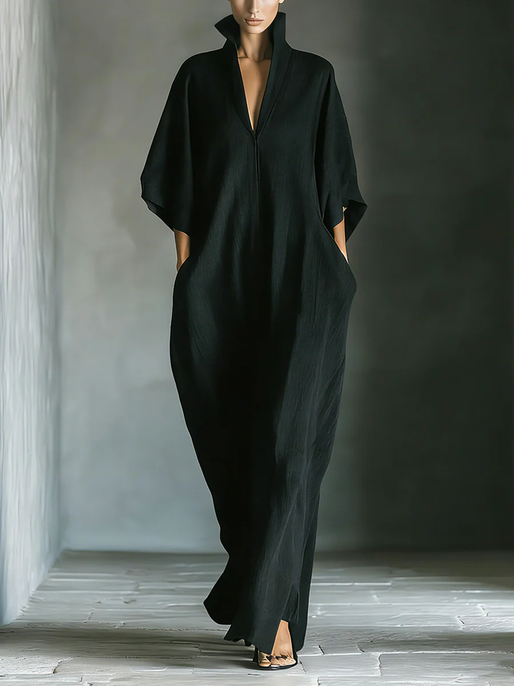 Black V-neck maxi dress with draped batwing sleeves and relaxed straight fit