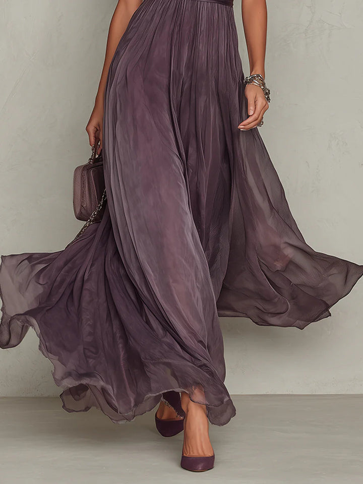 Dark plum sheer tulle maxi skirt with layered ruffle hem and gathered waist