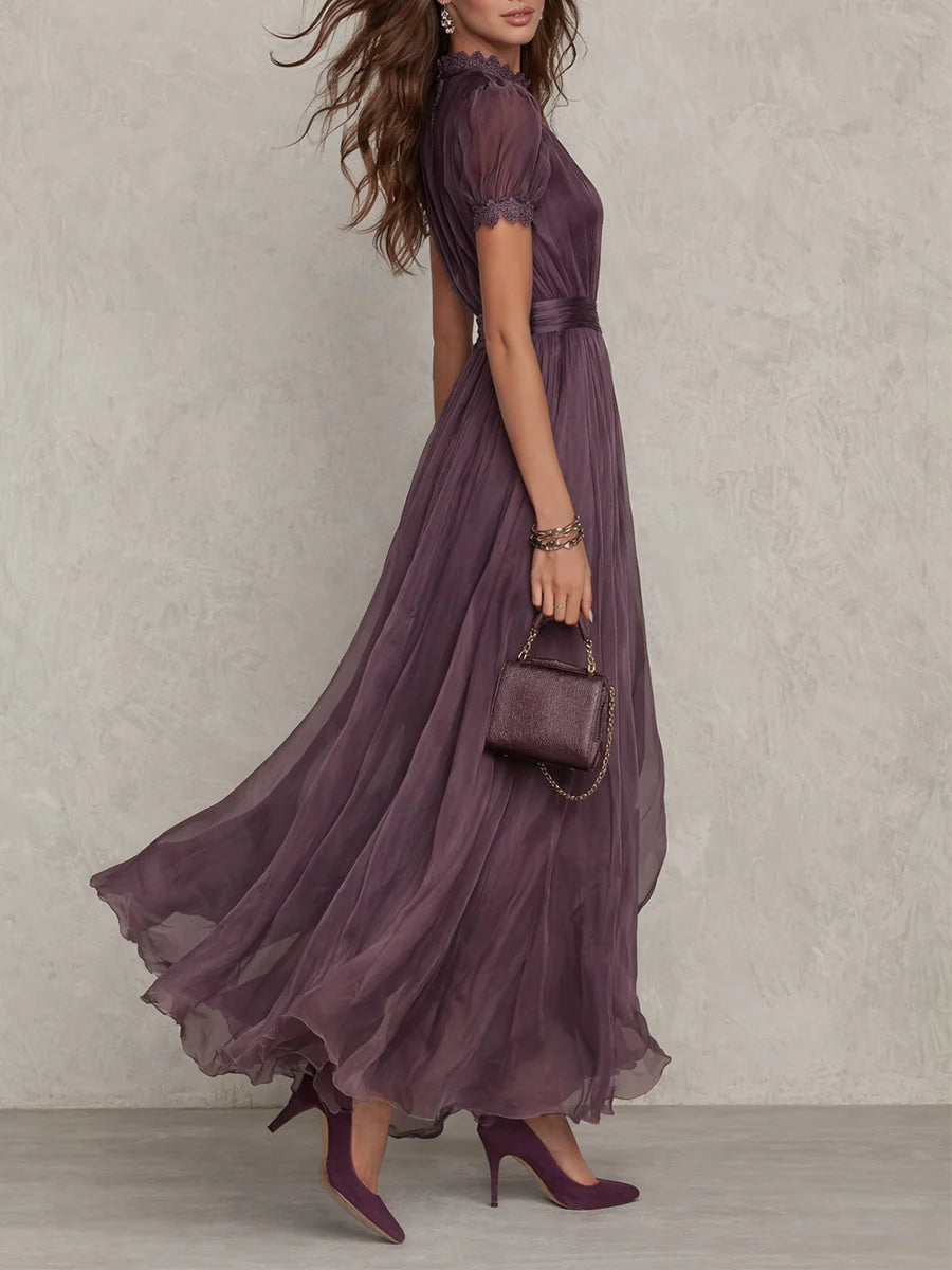 Dark plum maxi dress with lace keyhole neckline, puff sleeves, full tiered skirt