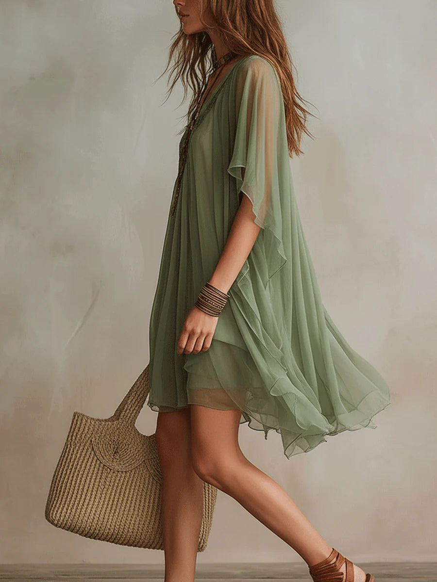 Olive chiffon mini dress with V-neck, draped short sleeves, tiered skirt