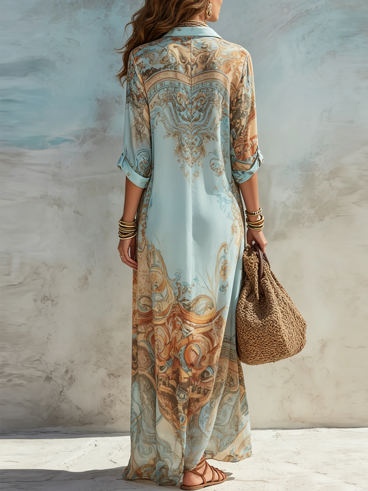 Back view of light blue maxi dress with baroque scroll print, V yoke, 3/4 sleeves