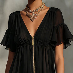 Black V-neck mini dress with gold front zipper and lace trim hem