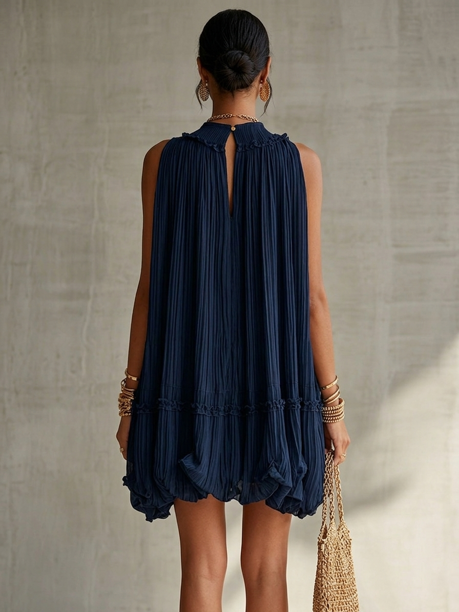 Navy chiffon halter mini dress with pleated back and tiered ruffled hem