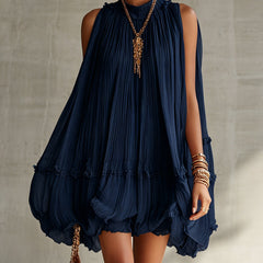 Navy chiffon halter mini dress with pleated tiers and ruffled hem