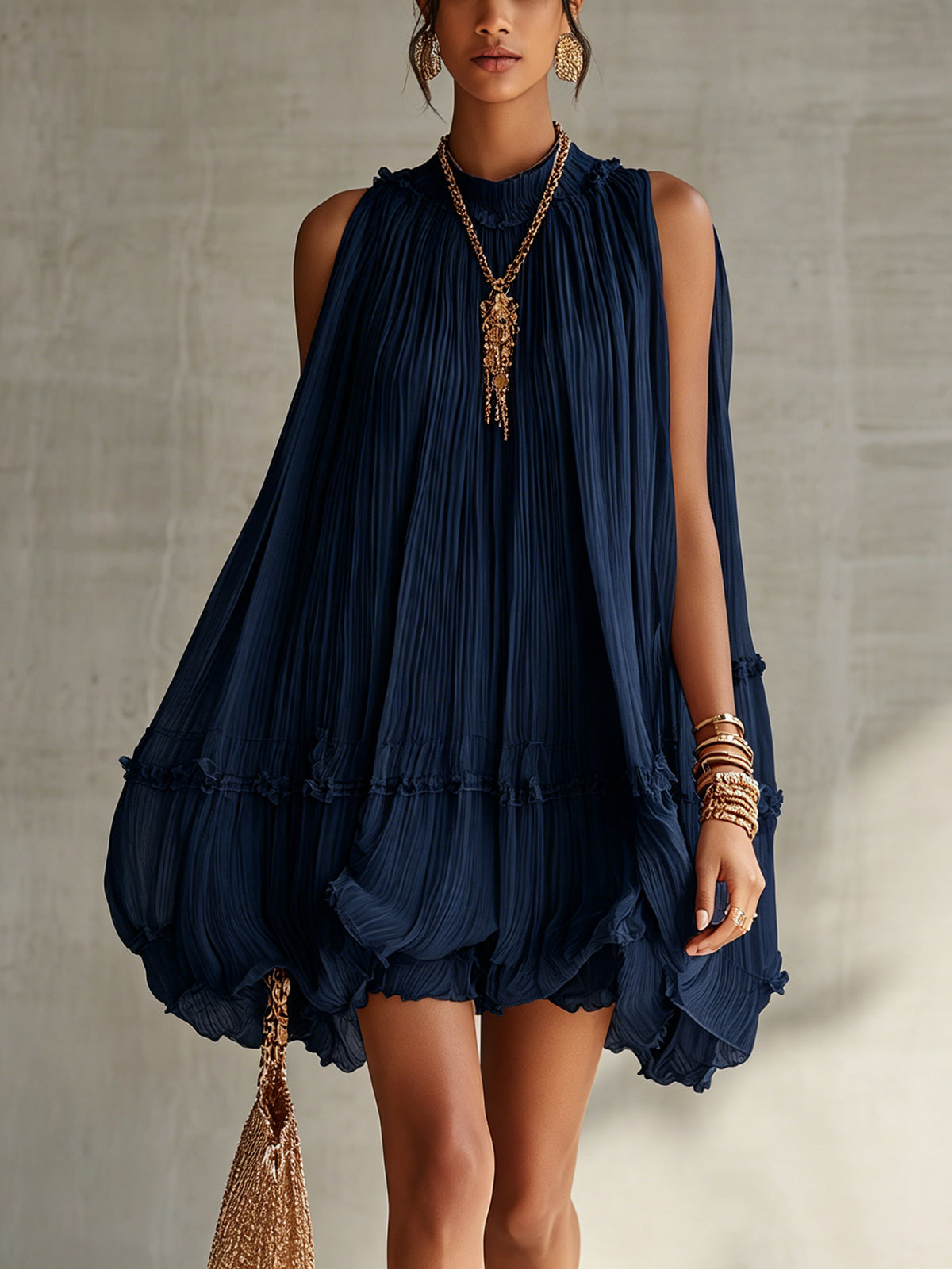 Navy chiffon halter mini dress with pleated tiers and ruffled hem