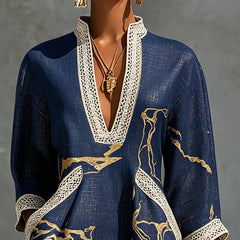 Aurelia crochet lace mini dress in navy with gold pattern and scalloped lace trim.