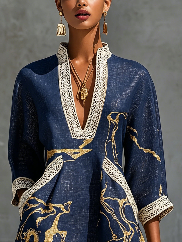 Aurelia crochet lace mini dress in navy with gold pattern and scalloped lace trim.