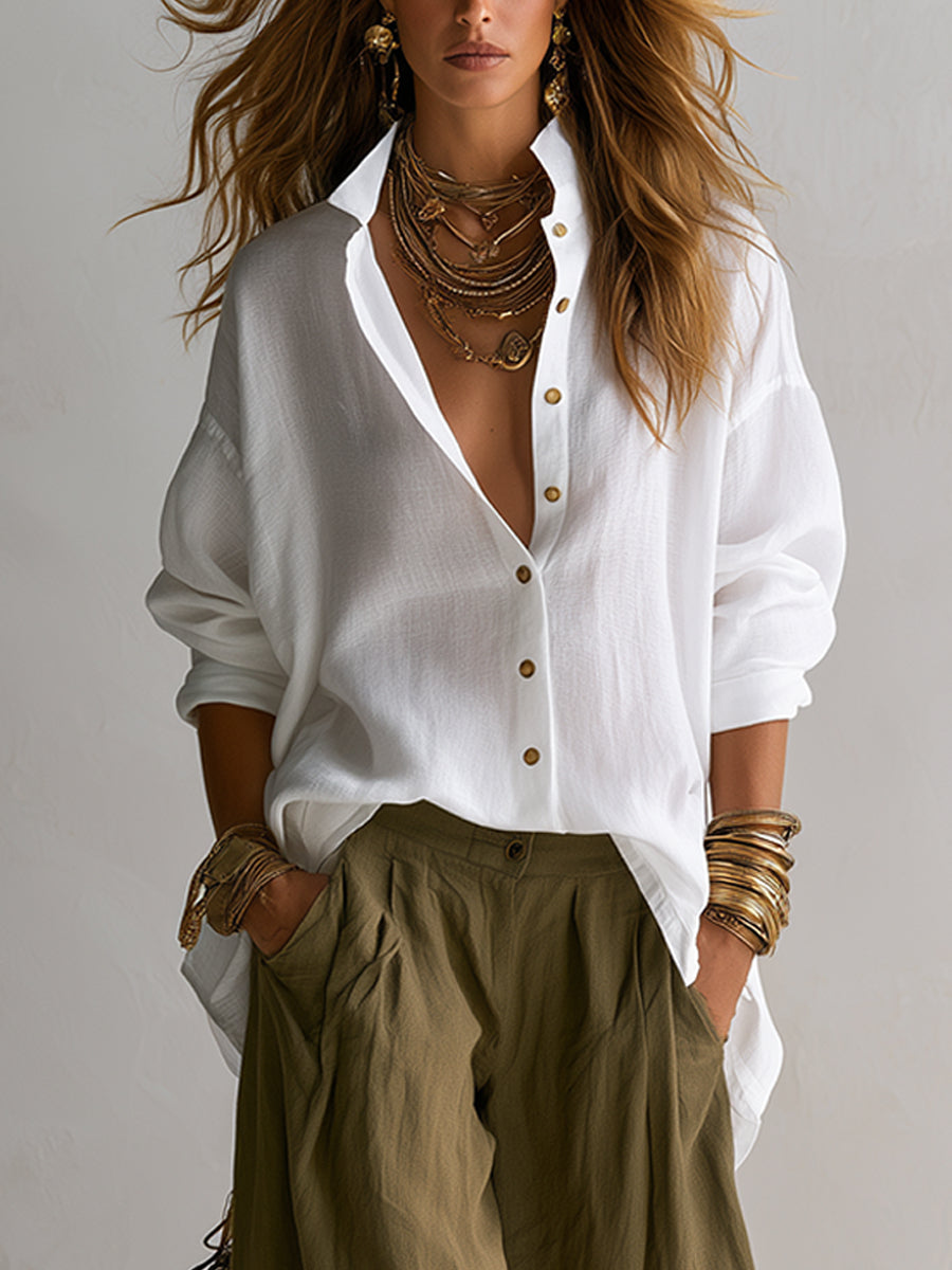 Two-piece linen set: white linen blouse with gold buttons over olive drawstring pants